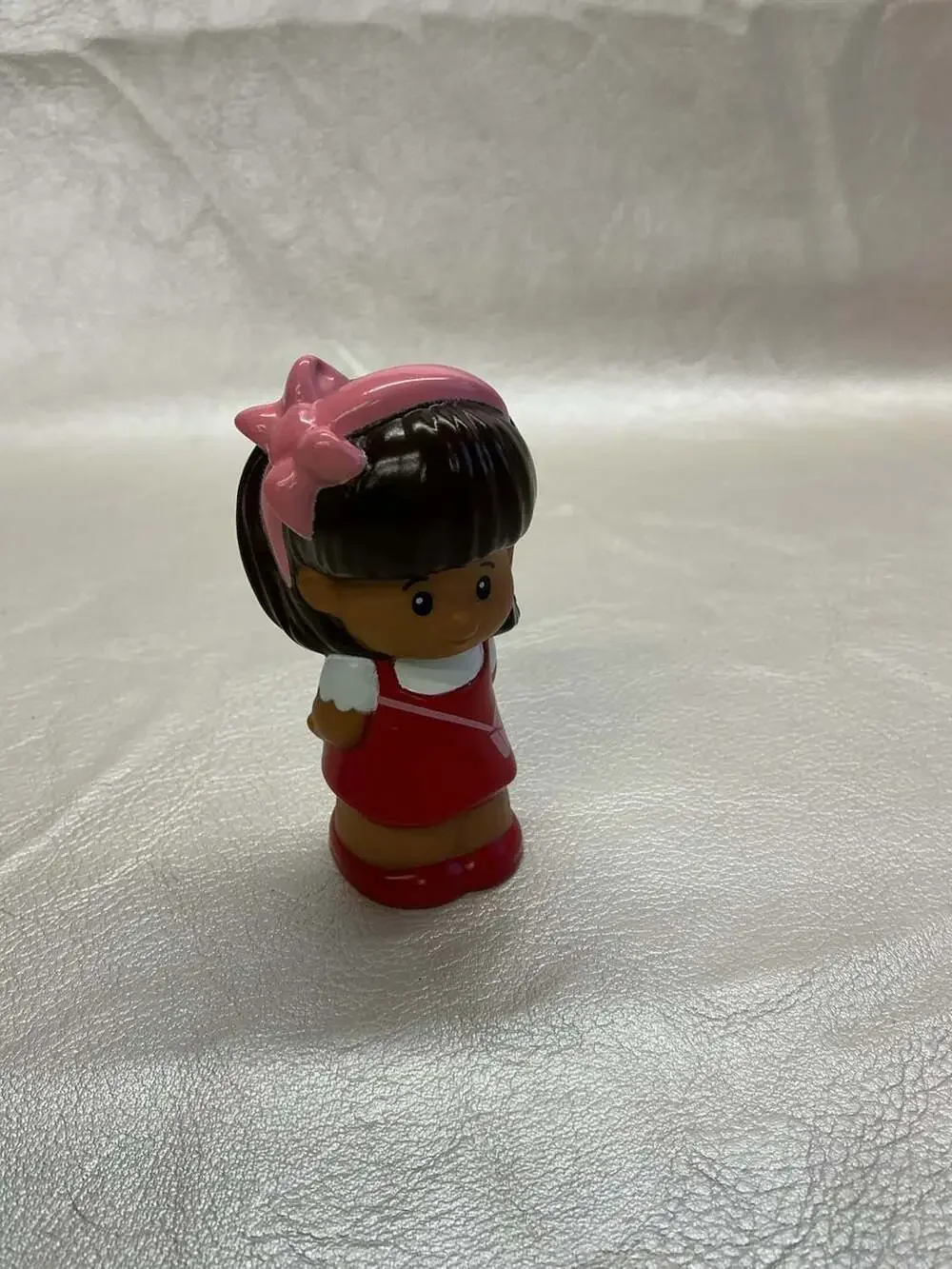 Fisher-Price Little People Mia Figure in Red Dress with Pink Bow